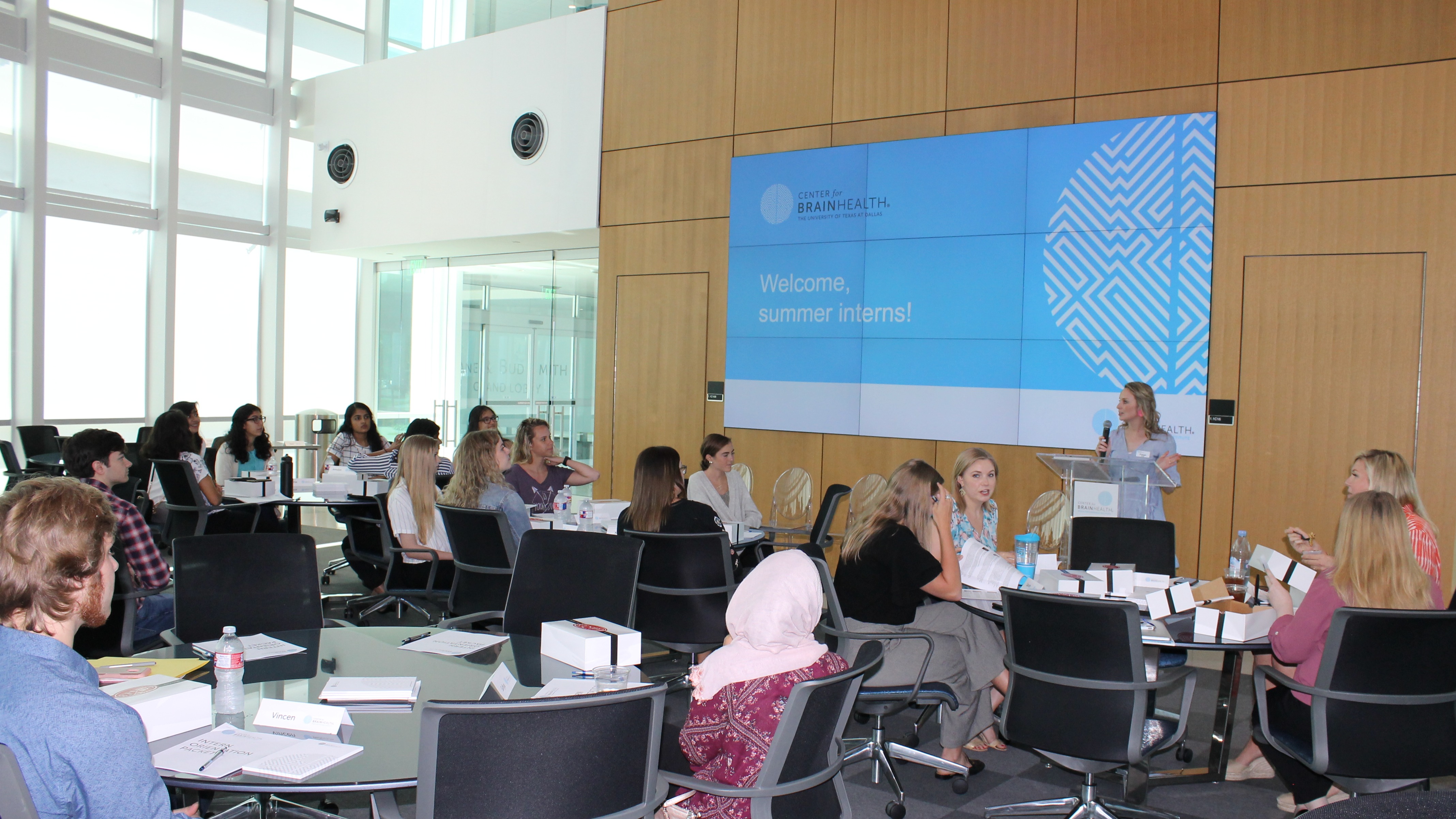 Summer interns engage in a SMART Brain Training workshop.