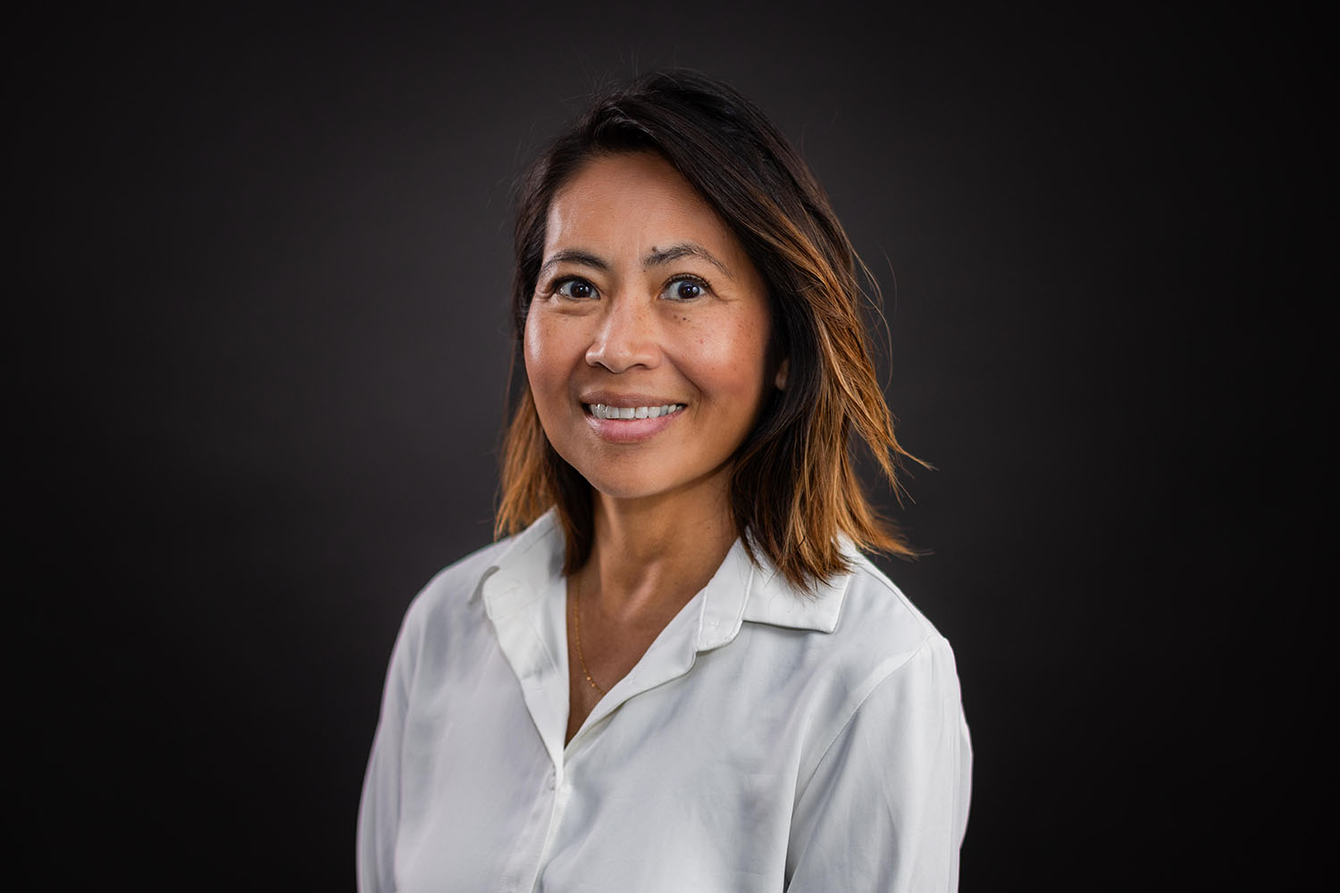 Headshot of Franscesca Filbey, PhD, against a dark background.