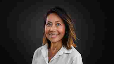 Headshot of Franscesca Filbey, PhD, against a dark background.