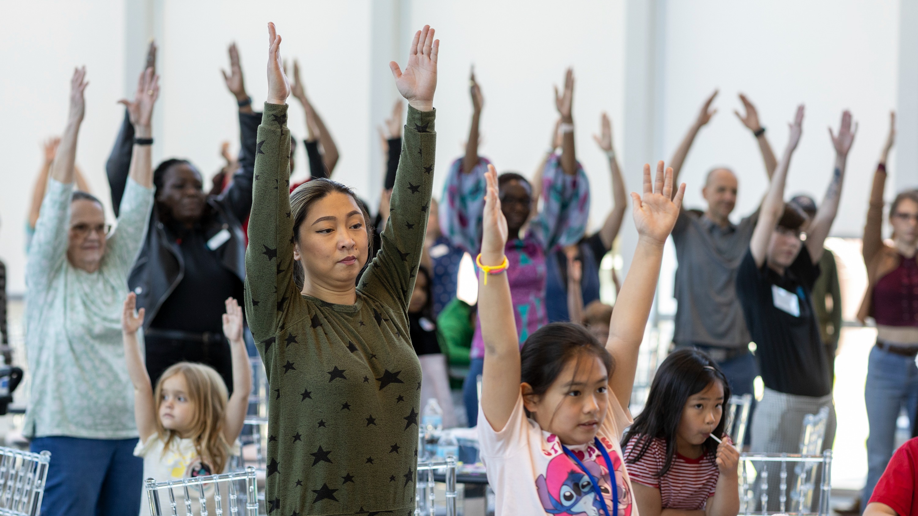 Families engage in brain-healthy fun with the Dallas Black Dance Theater at Family Fair during BrainHealth Week 2024.
