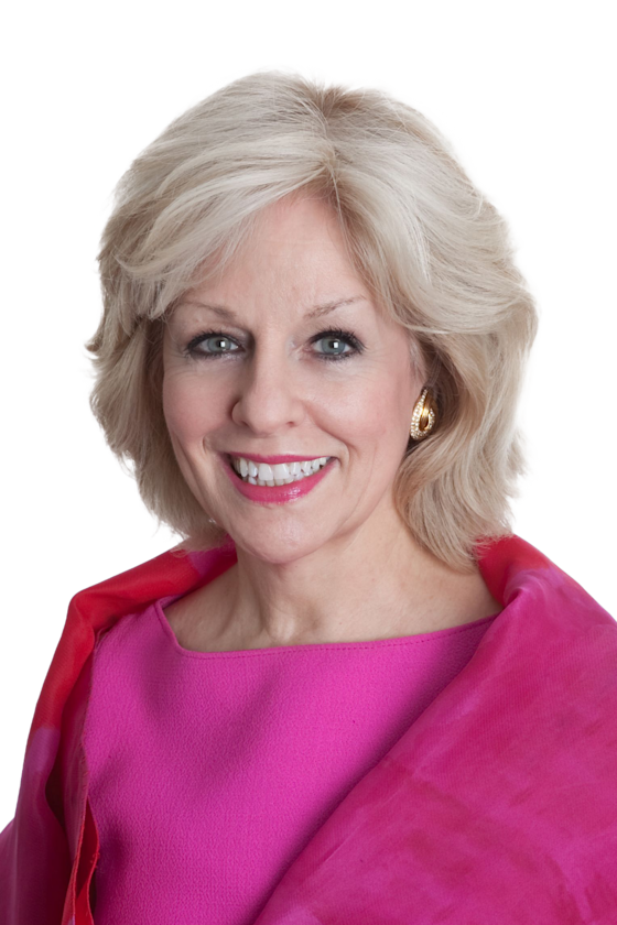 Sandra Bond Chapman, PhD cutout in a pink blouse