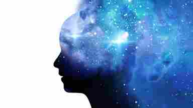 Abstract silhouette of a human with a space nebula in a white background.