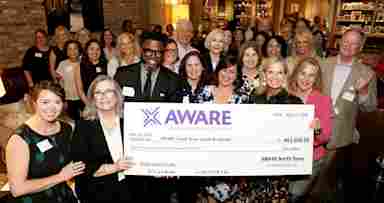AWARE 2026 recipients with Ann McKinley (second from the left front row)