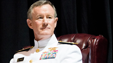 A photograph of Admiral William H. McRaven in a white uniform looking off to his right.