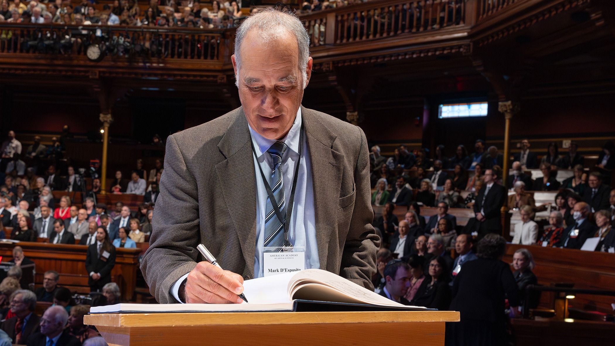 Dr. Mark D’Esposito’s induction into the AAAS, signing the same book as George Washington!