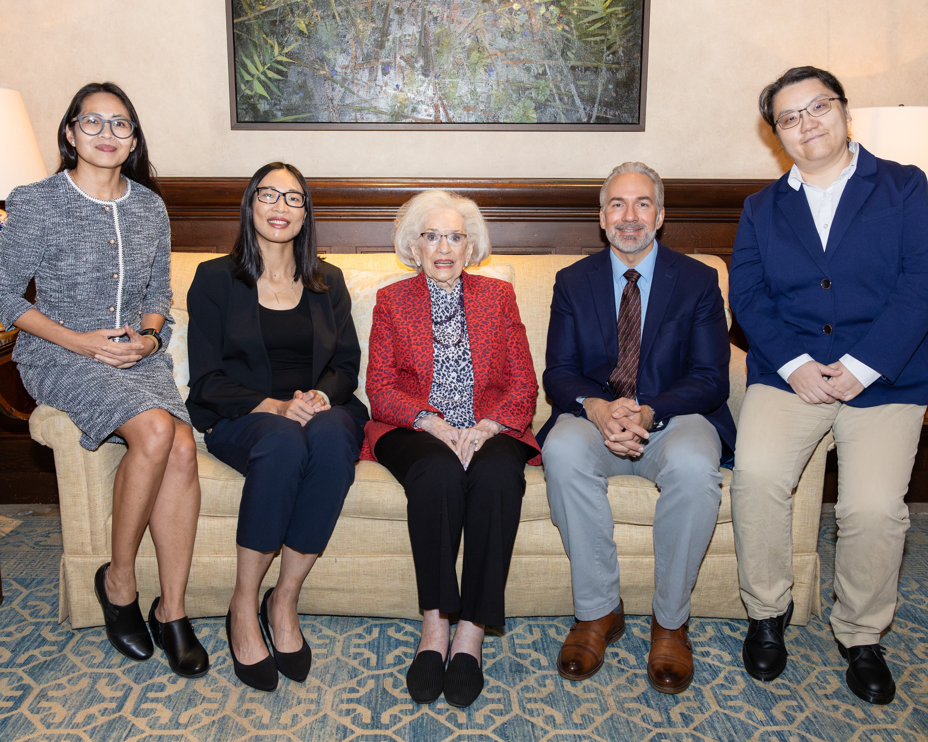 Scientists participating in research supported by the 2026 Friends of BrainHealth campaign, seated with Ramona Jones (center), the namesake of the current scientist selection luncheon and research competition event.