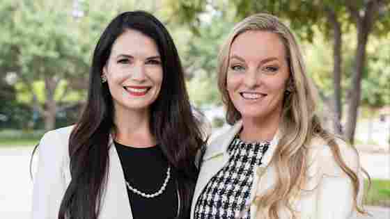 2027 Friends of BrainHealth Co-Chairs Katie Doherty and Laine DiStefano, pictured outdoors in sunlight with a background of trees.