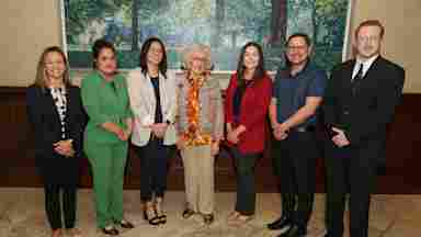 Jessica Kraft, PhD, Ashley Campos, Jessica Ma, Ramona Jones, Micaela Andreo, Tracy Brown and Hulon Sherard attend the 2024 Ramona Jones Friends of BrainHealth Luncheon.
