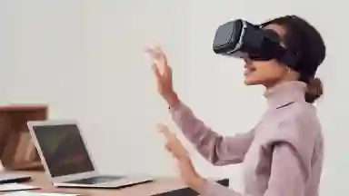 Women of color using VR googles at the office