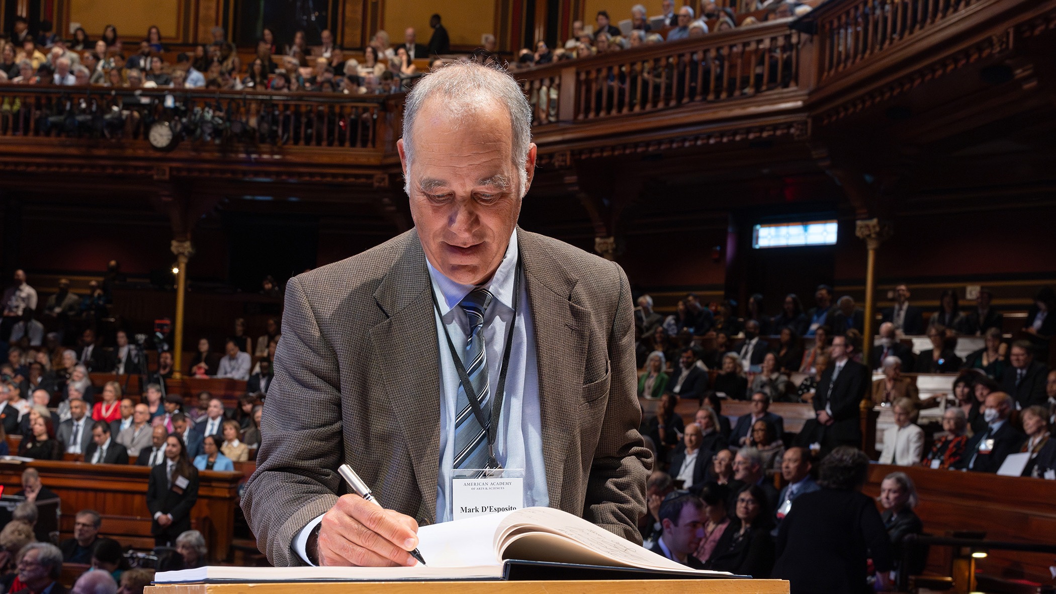 Dr. Mark D’Esposito’s induction into the AAAS, signing the same book as George Washington!
