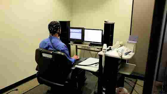 Man doing EEG activity to measure brain activity