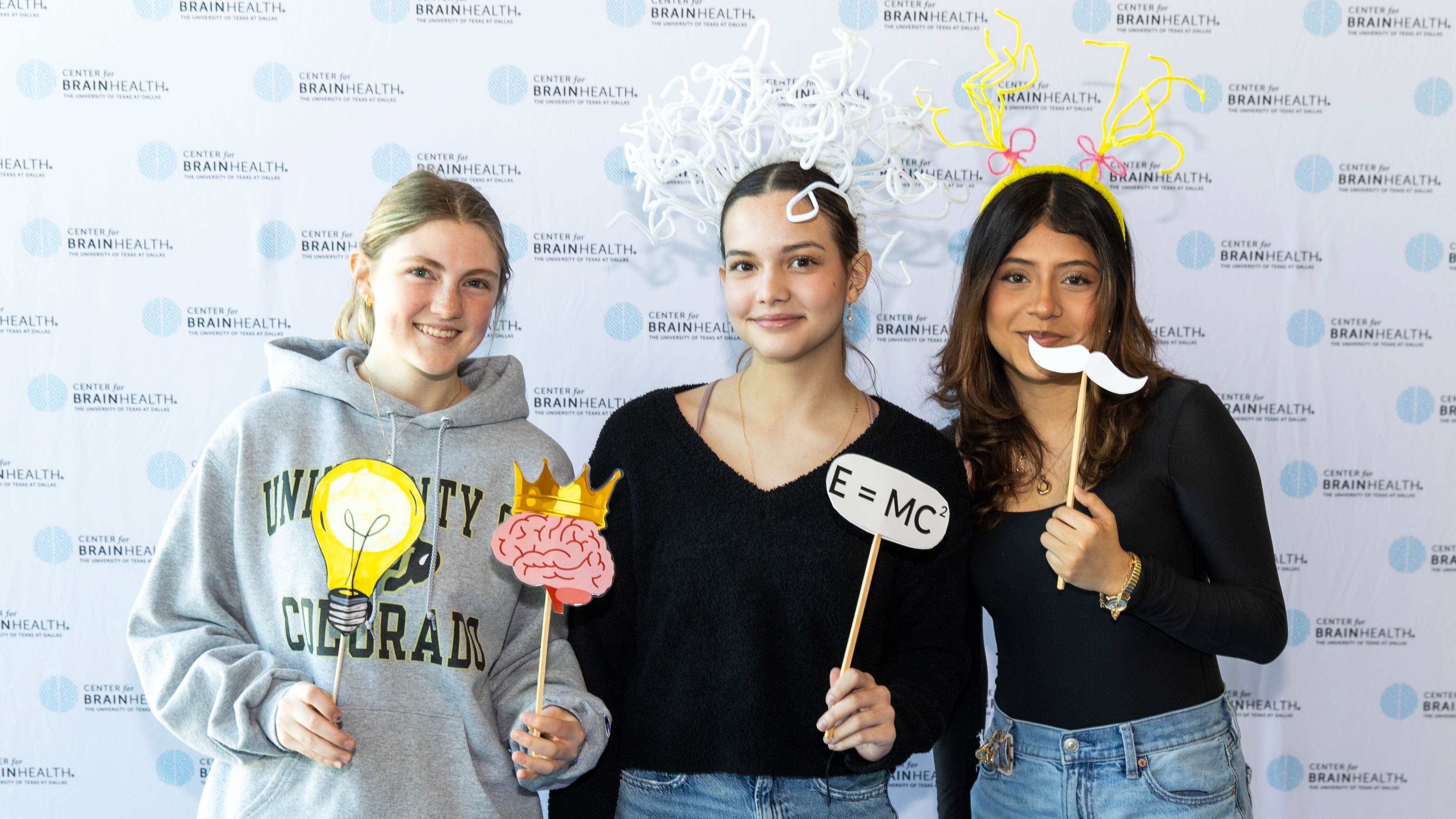 College students take advantage of the photo wall at Center for BrainHealth's annual BrainHealth Week.