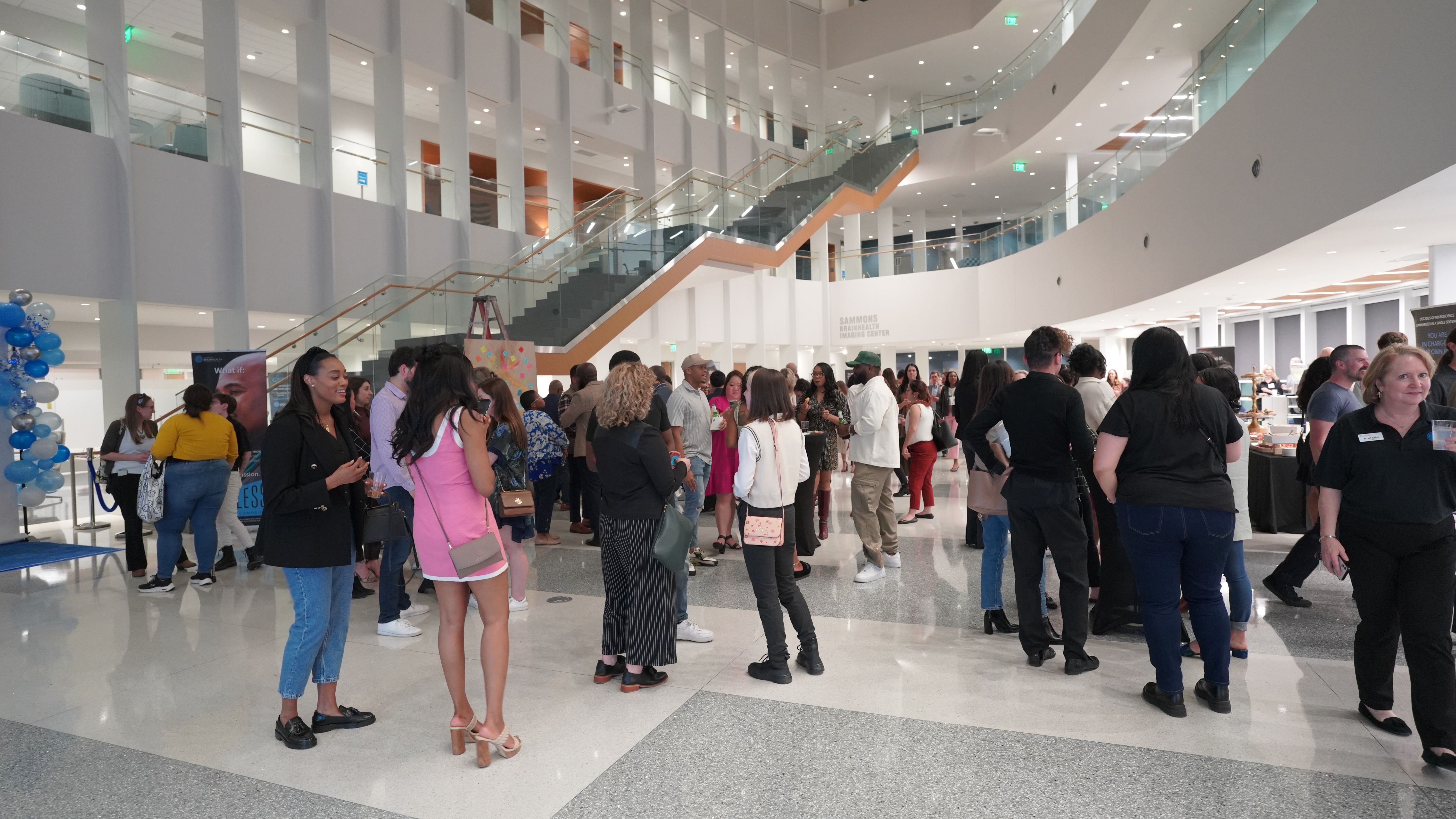 A room full of happy attendees at the Art-Infused Happy Hour during BrainHealth Week 2023. 