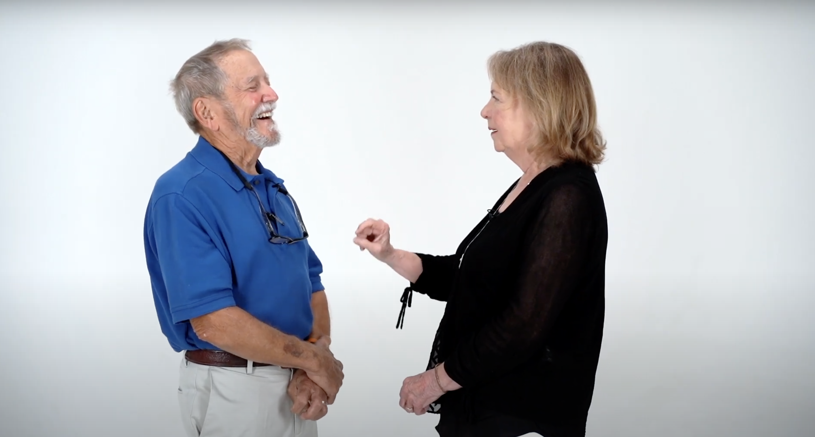 Bob and Annette Jenkins talking and laughing with each other.