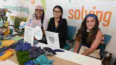 Graycie Montfort (right), shown with UT Dallas students Carys Lopez (left) and Zainab Shah, raised $1,300 for the Callier Center for Communication Disorders during North Texas Giving Day. Part of her donation came from the sales of hair accessories at her pop-up store at the Callier Center.