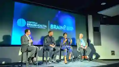 The panel discussing among themselves.