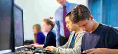 A teacher catches a student texting during class