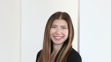 Julie Fratantoni is wearing a black blazer with a white, plain background- Hero. landscape. Close-up. Head of Operations, The BrainHealth Project™, Research Scientist, BrainHealth Research.