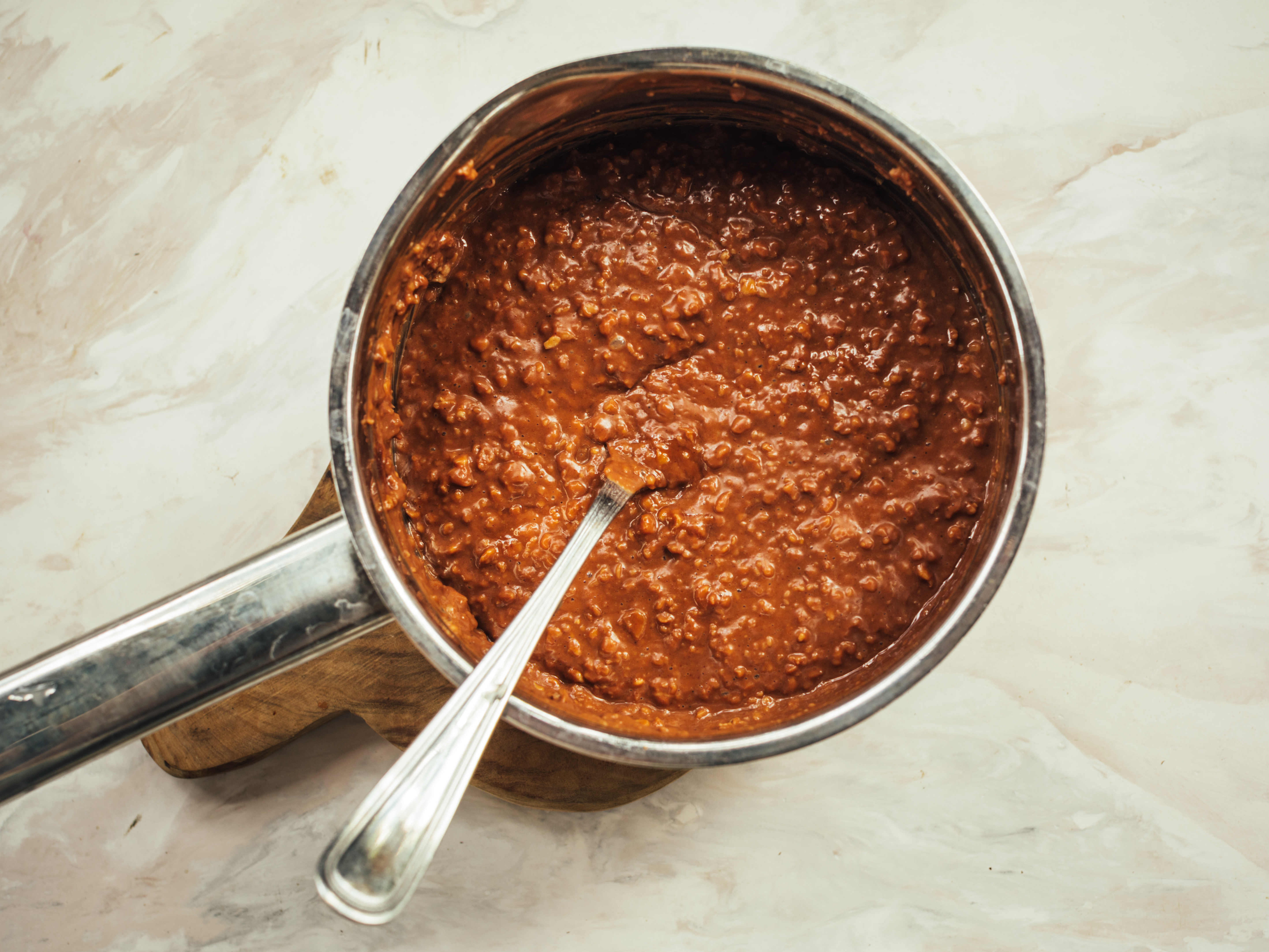 Schritt 1: Unter gelegentlichem Rühren alles köcheln lassen, bis das Porridge eingedickt ist