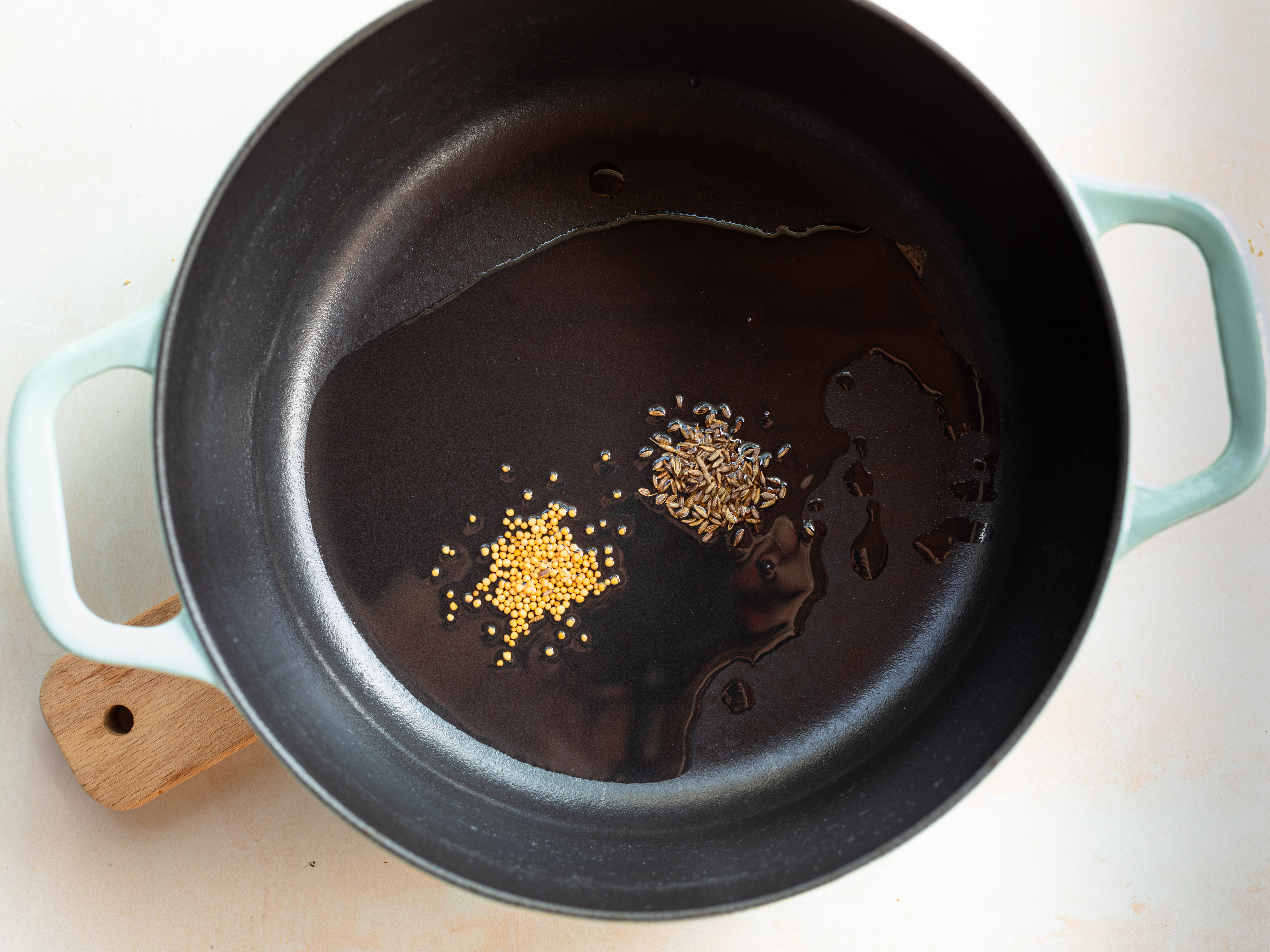 Schritt 2: In einem grossen Topf Ghee oder Kokosnöl erhitzen