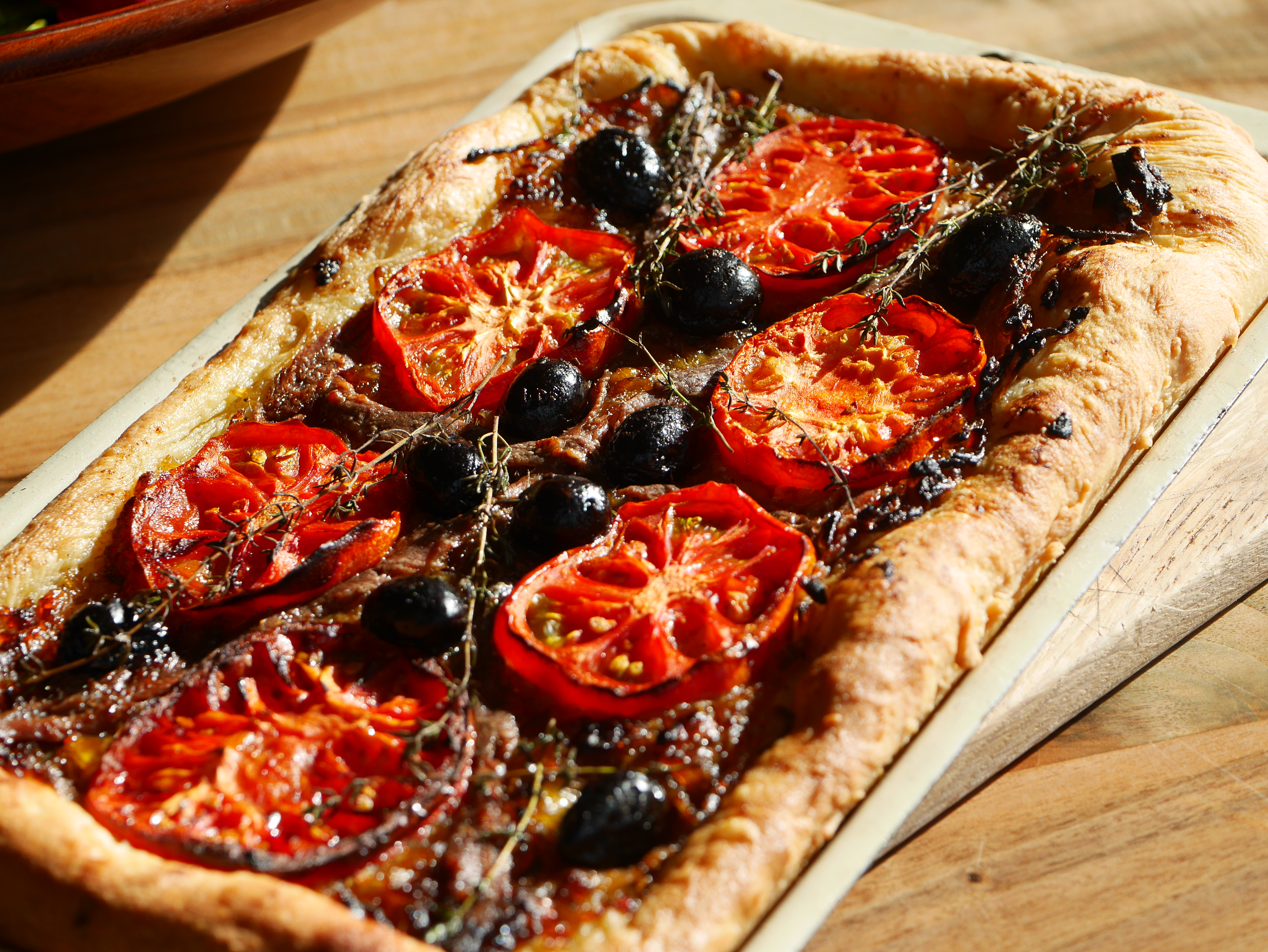 Schritt 2: Pizzaboden belegen und backen