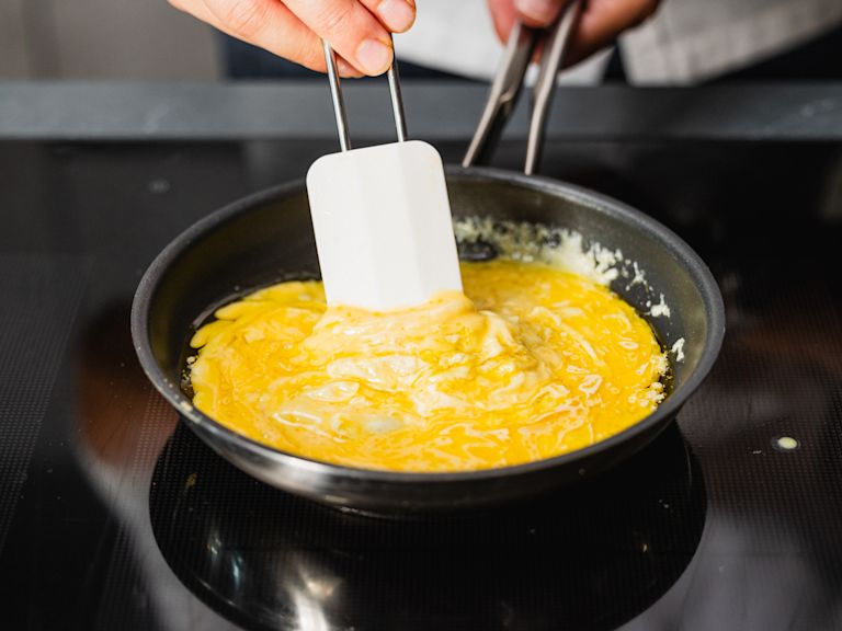 Schritt 2: Ei zubereiten/soufflieren Schritt 2: Ei zubereiten/soufflieren