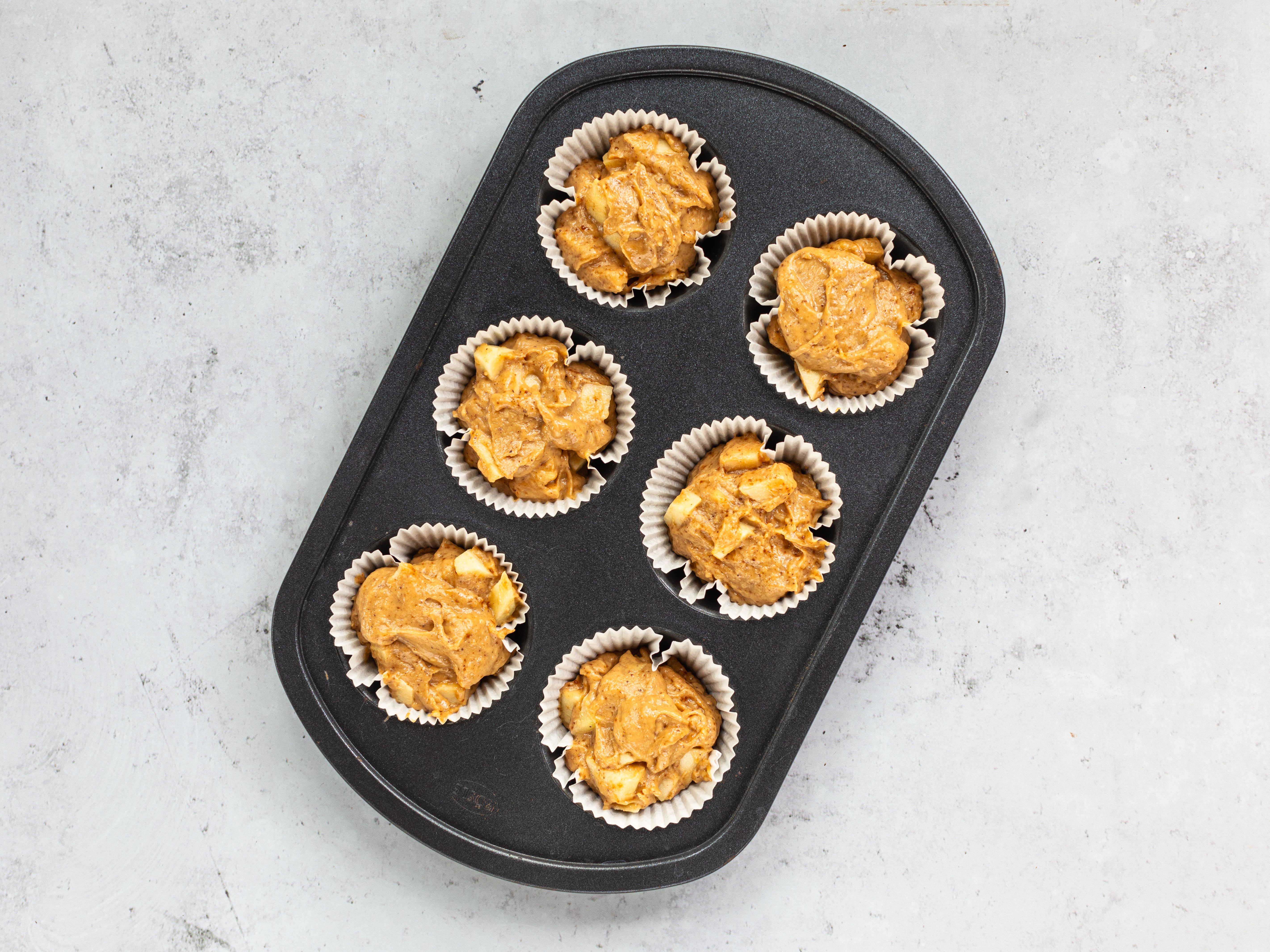 Schritt 3:  Muffinförmchen befüllen  