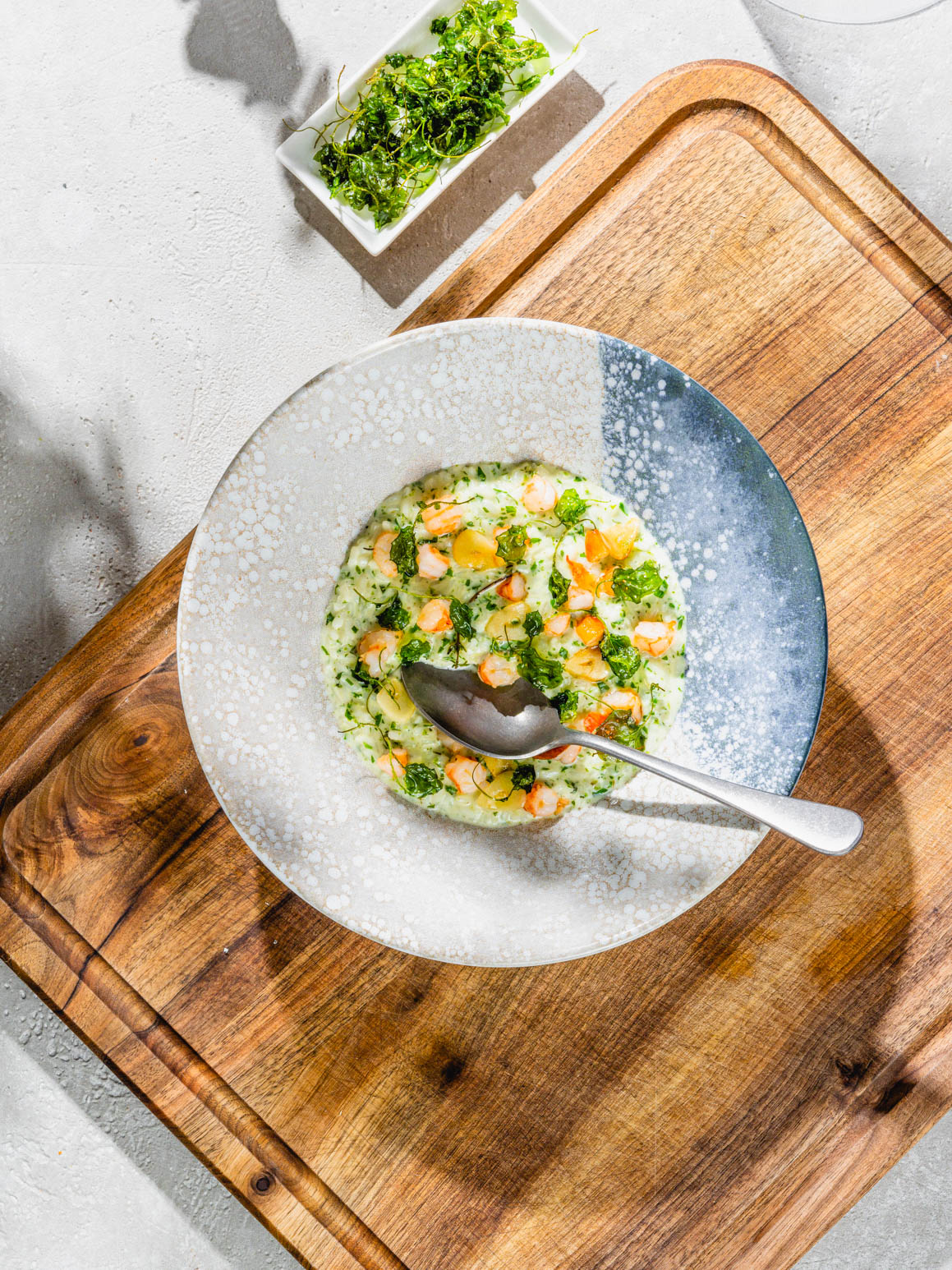 Kräuter Risotto mit knusprigem Barbarakraut und Riesenkrevetten  Rezept