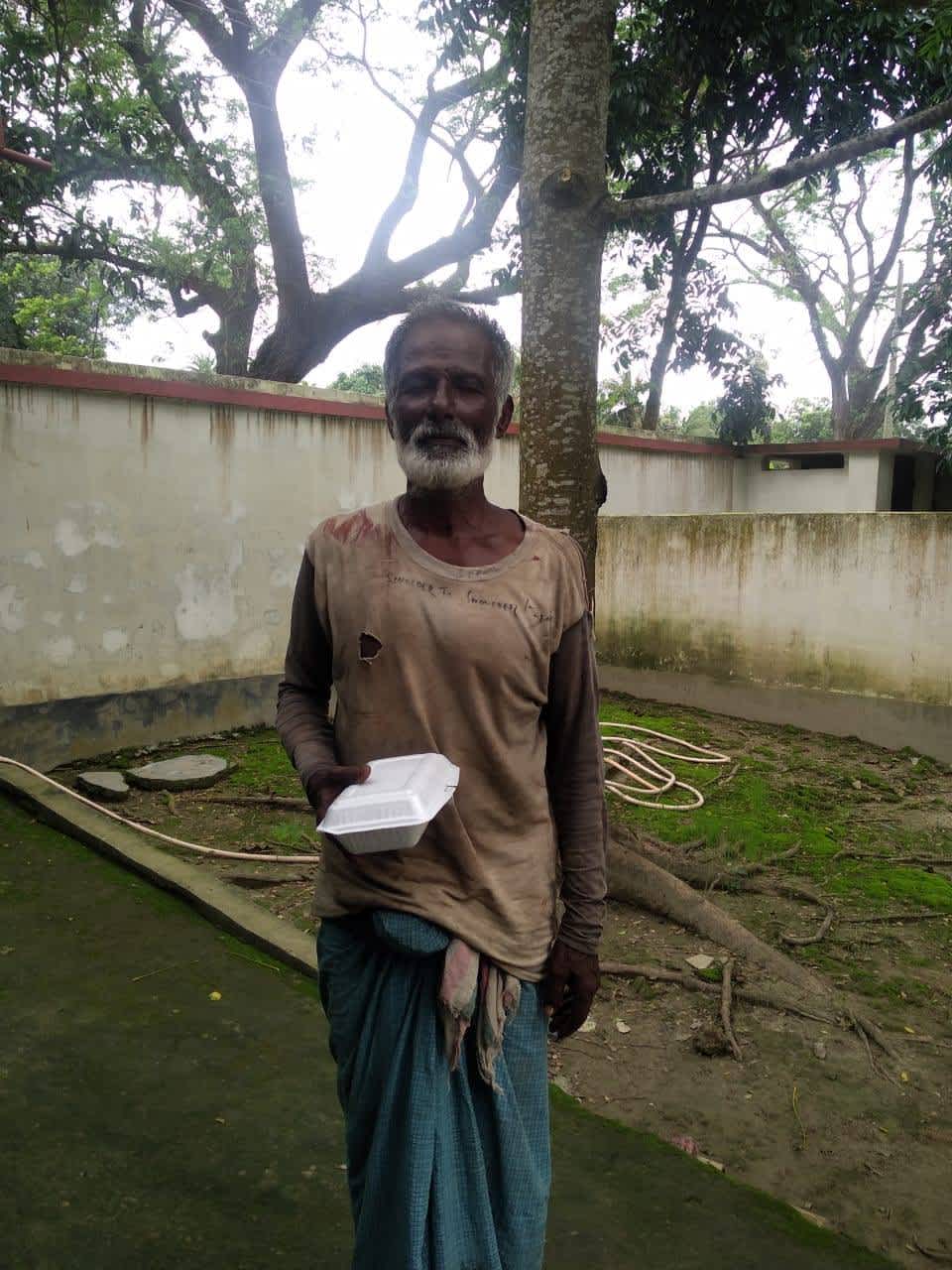 Man receiving cyclone relief 