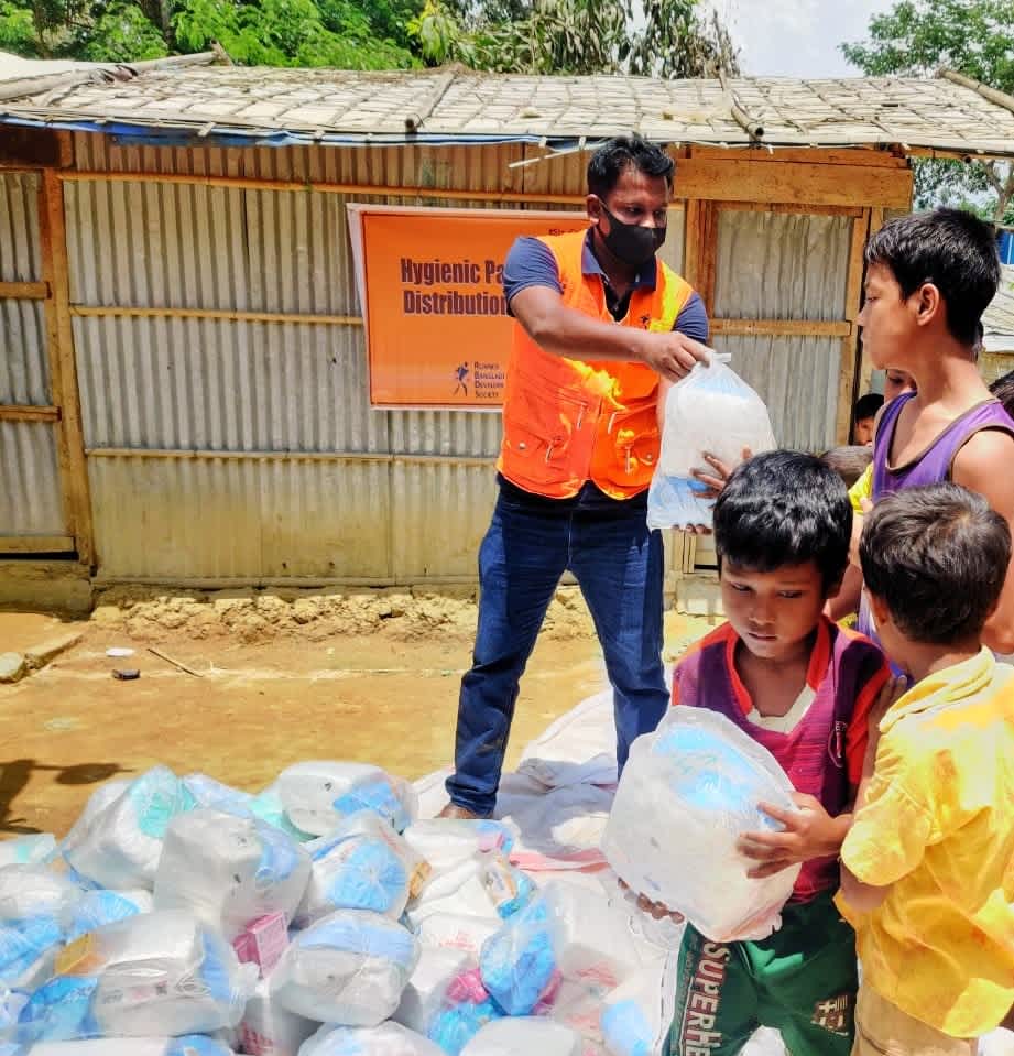 Young Rohingya receiving hygiene supplies