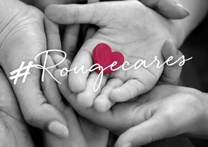 Holding hands with #Rougecares text