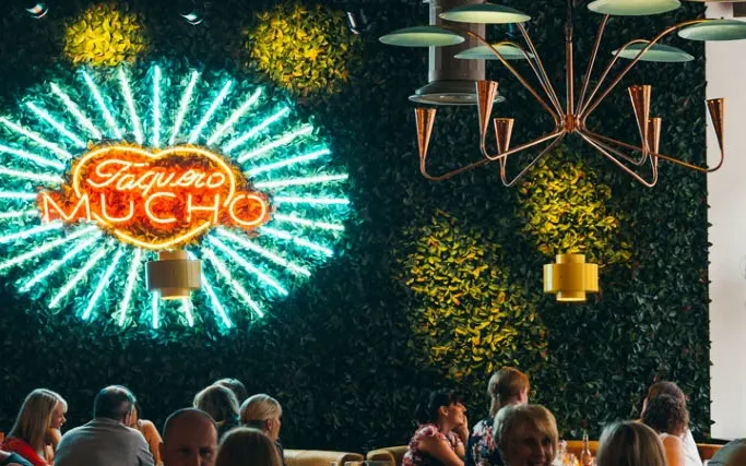 Neon light and plant wall at Las Iguanas Newcastle
