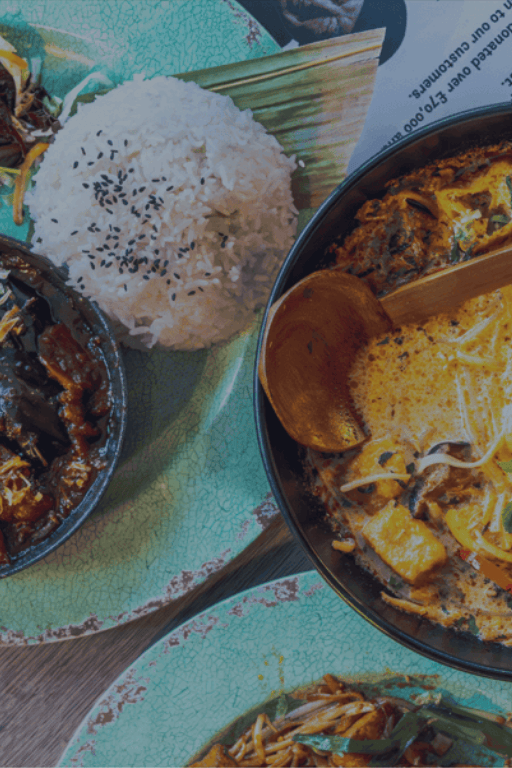 A groupshot, with a focal point on our Laksa dish