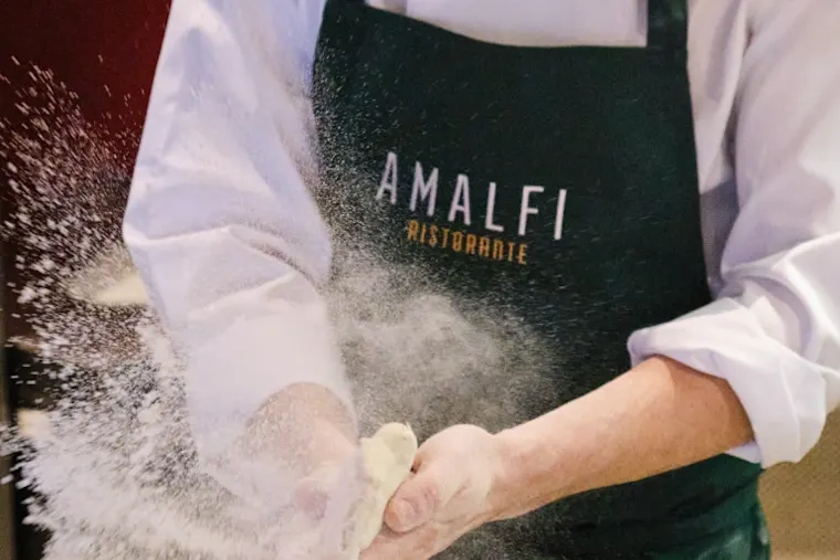 A picture of dough being kneaded