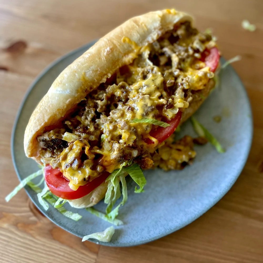Greek Chopped Cheese Roll made with Impossible™ Beef. 