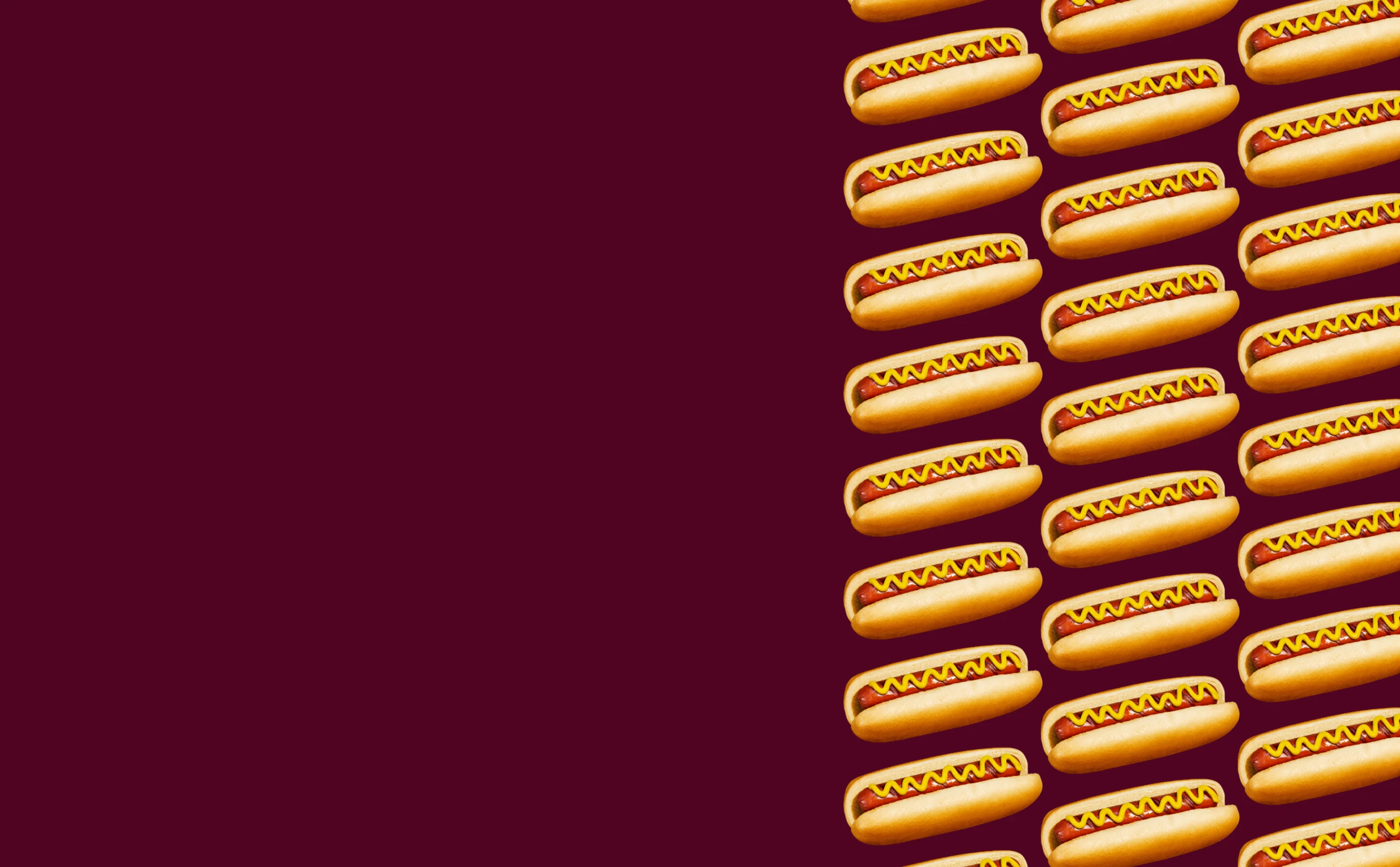 Solid background featuring pattern of Impossible Beef Hot Dogs