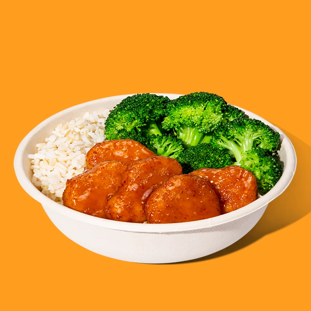 School lunch featuring Impossible Chicken, broccoli and rice