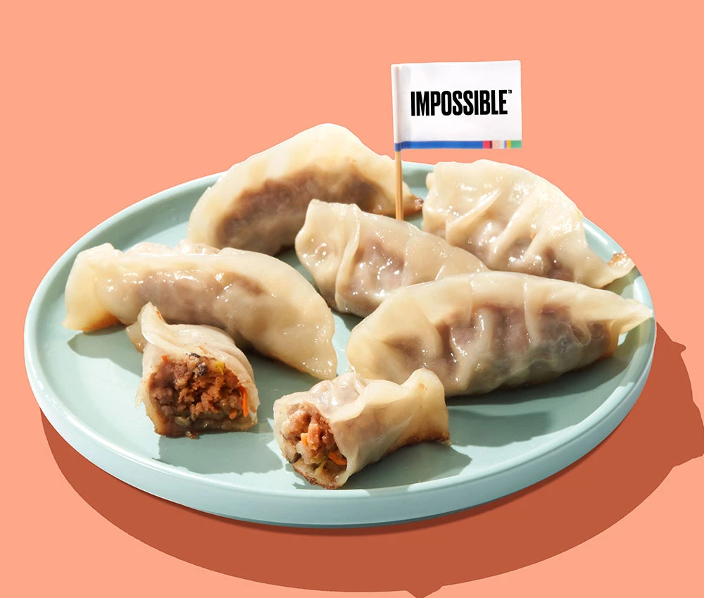 Plate of Impossible™ Potsticker Dumplings made with Impossible™ Burger.