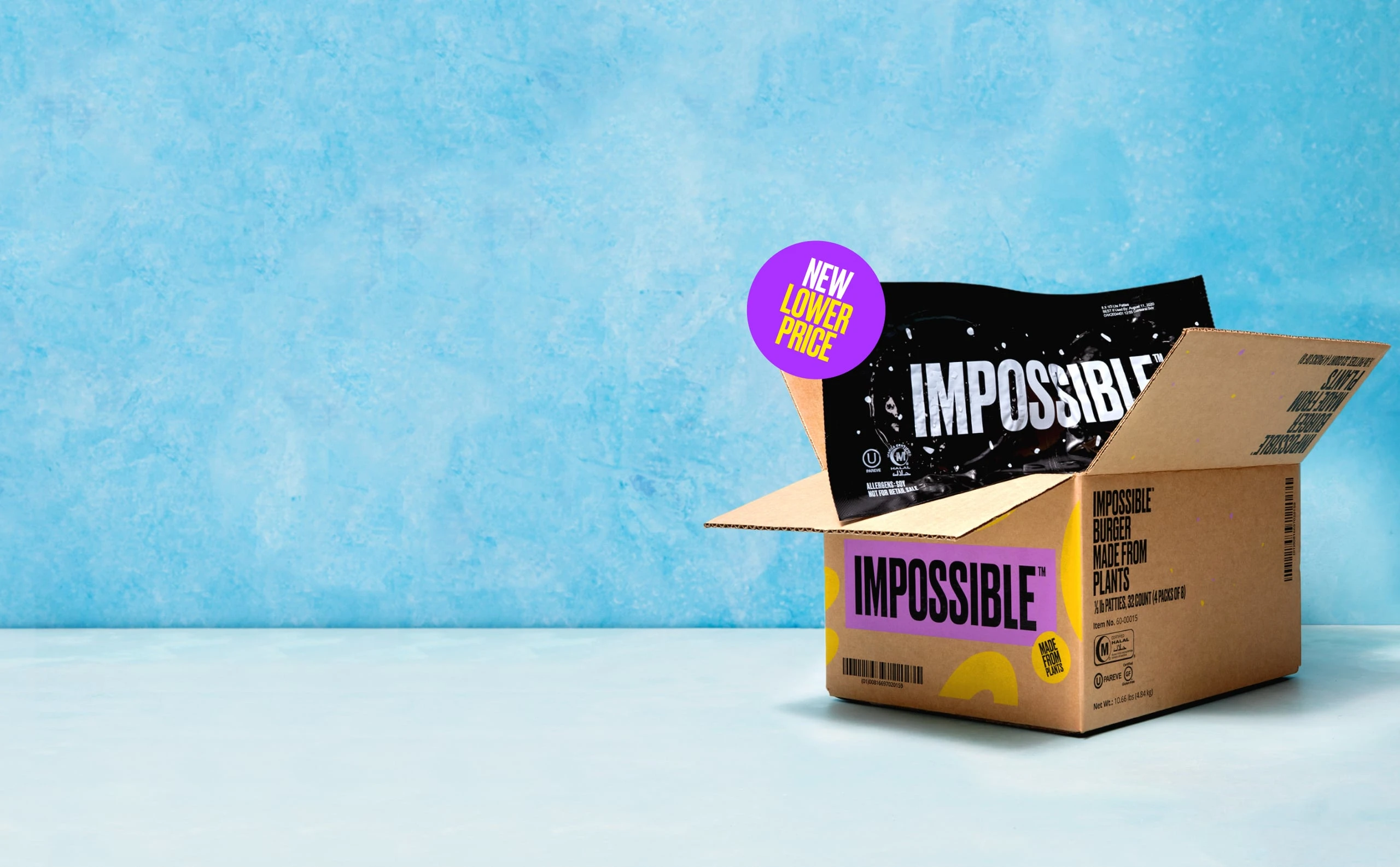 Impossible Burger packaged in Impossible branded box with new lower price sticker