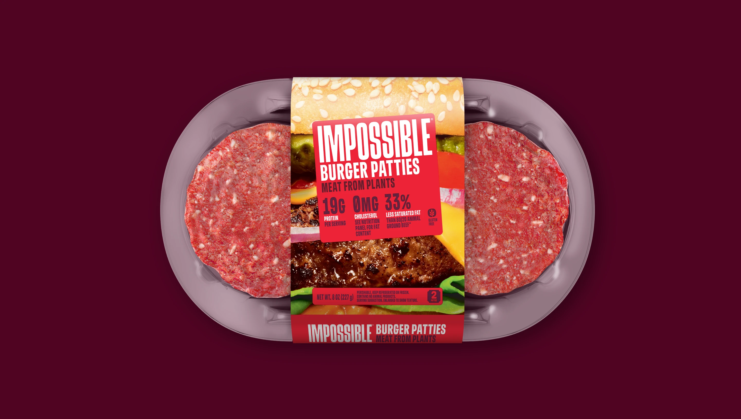 Front of pack of Impossible Beef Patties from plants on a dark background.