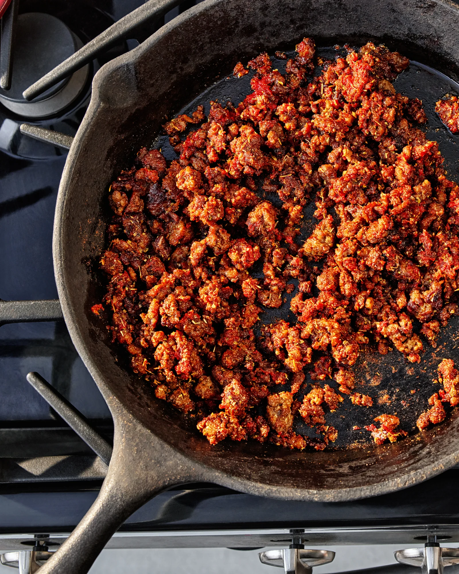Impossible Beef Brick ground in a frying pan.
