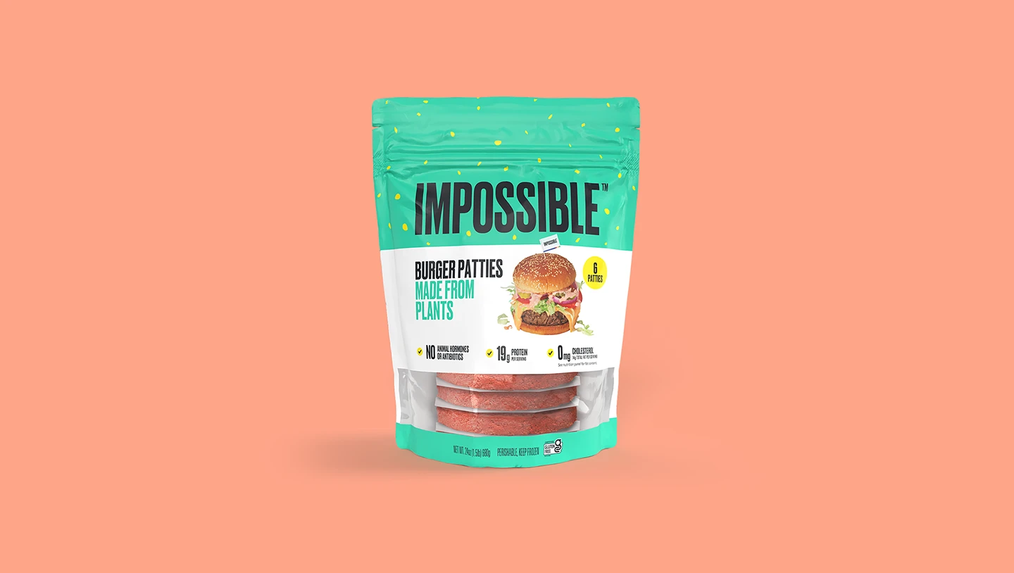 Impossible Burger frozen patties 6 ct package on pink background front angle