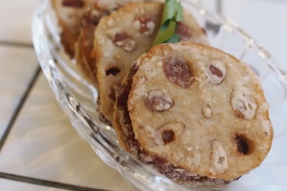 Plant based Impossible burger CNY Lotus Root Patties in glass bowl