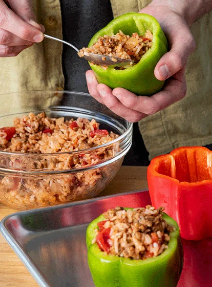 Impossible Sausage mixture being stuffed into bell peppers 