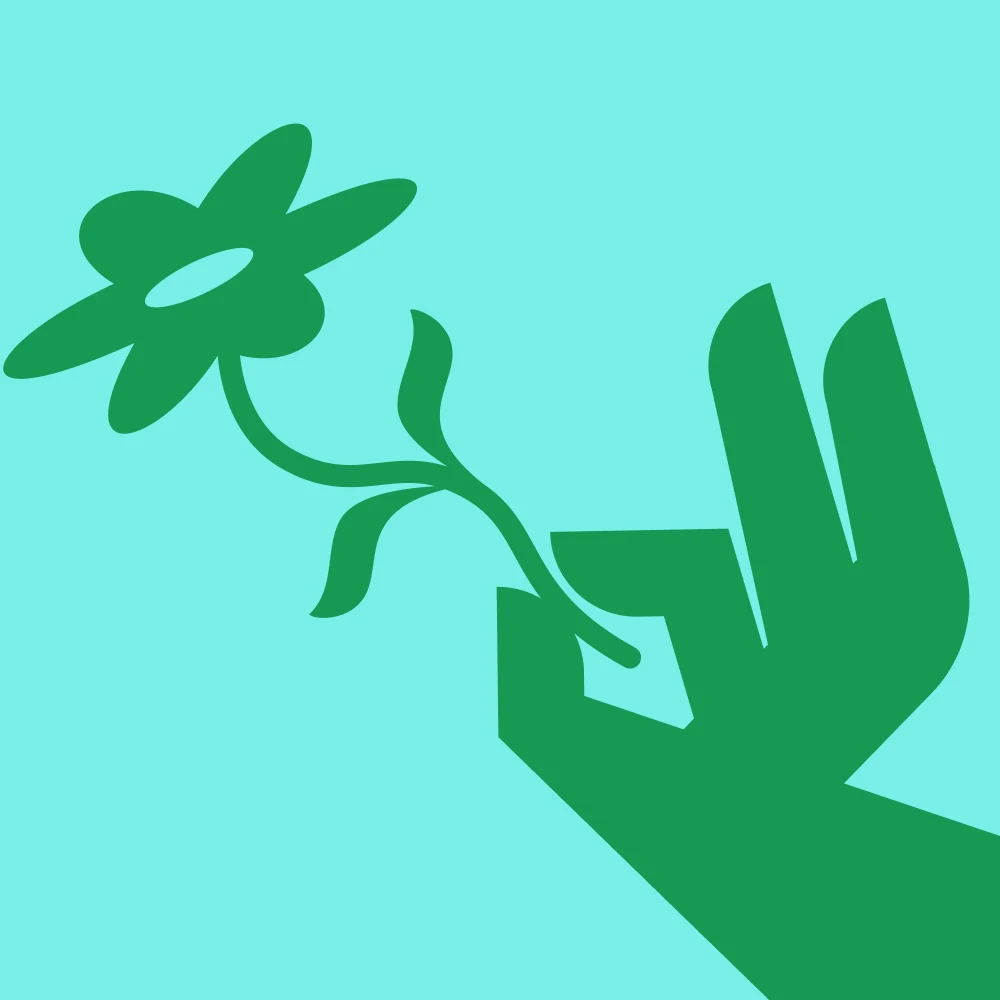 Impossible Foods sustainability depicted by a hand holding a flower