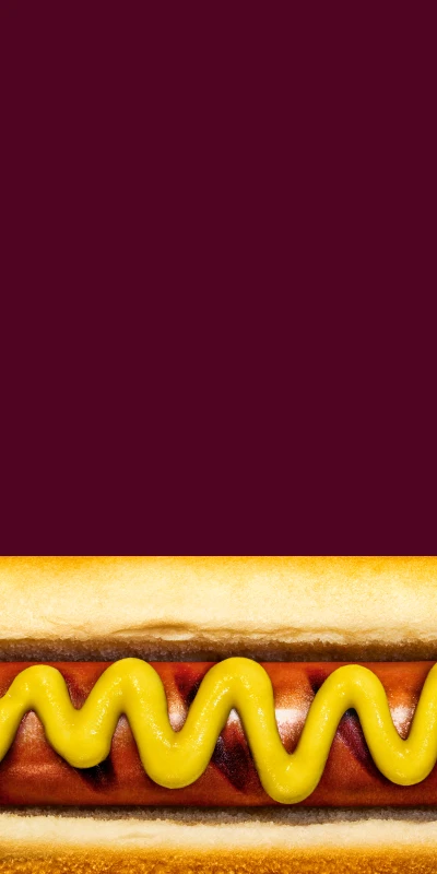 Solid background featuring pattern of Impossible Beef Hot Dogs