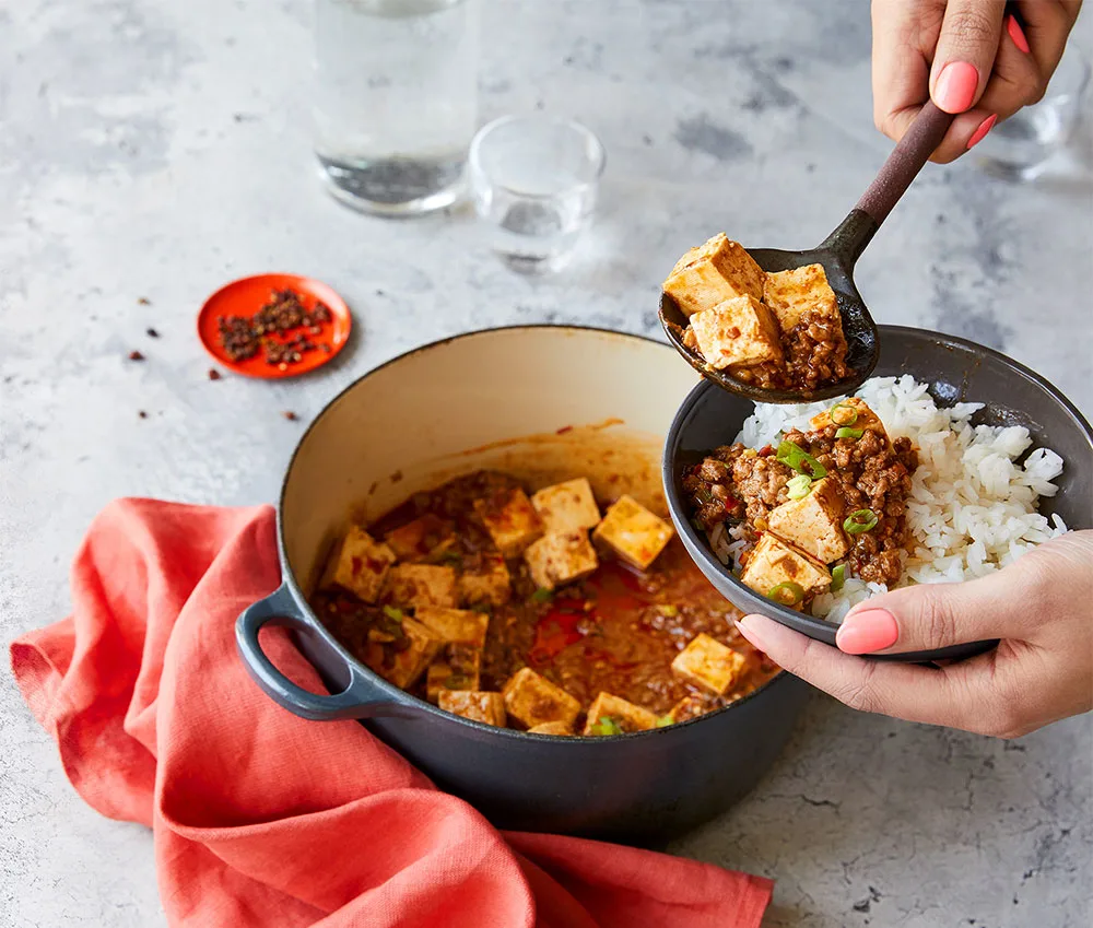 Steaming Impossible™ Mapo Tofu, made with Impossible™ Burger.