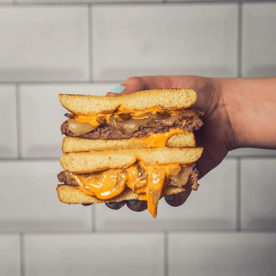 Jake's Wayback Burgers: Fast-food chain begins selling hamburger containing  NINE patties
