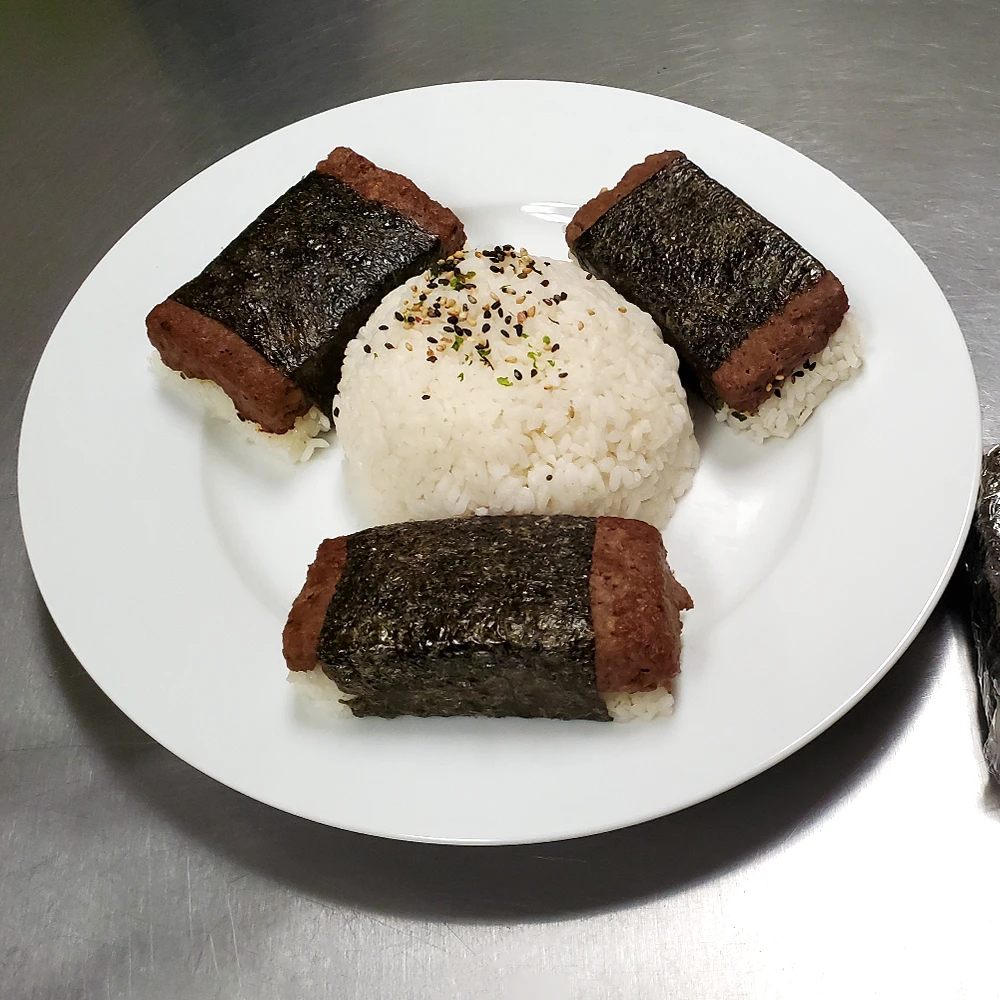 Try this  Impossible™ Musubi Recipe, featuring meat made from plants with ginger, garlic, and oyster sauce, and wrapped in nori.