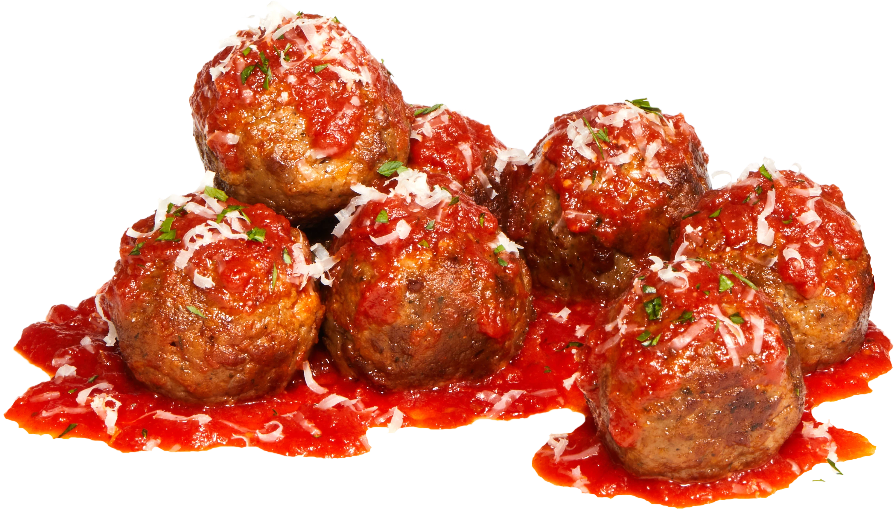 Impossible Meatballs covered in sauce and cheese 
